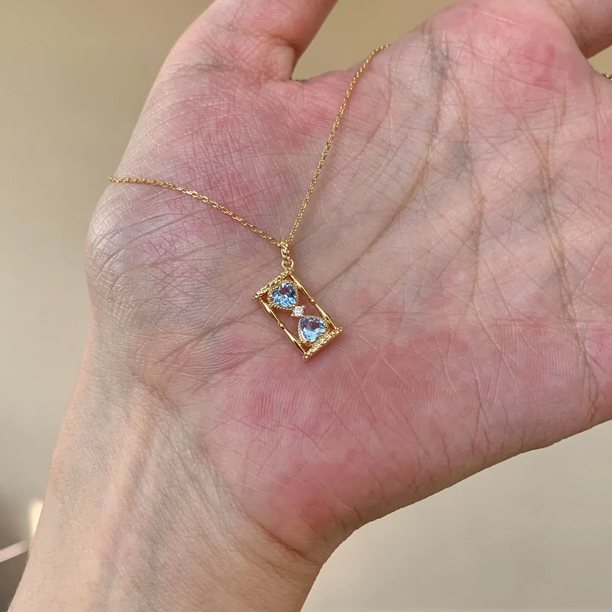 Elegant Hourglass Crystal Pendant Necklace