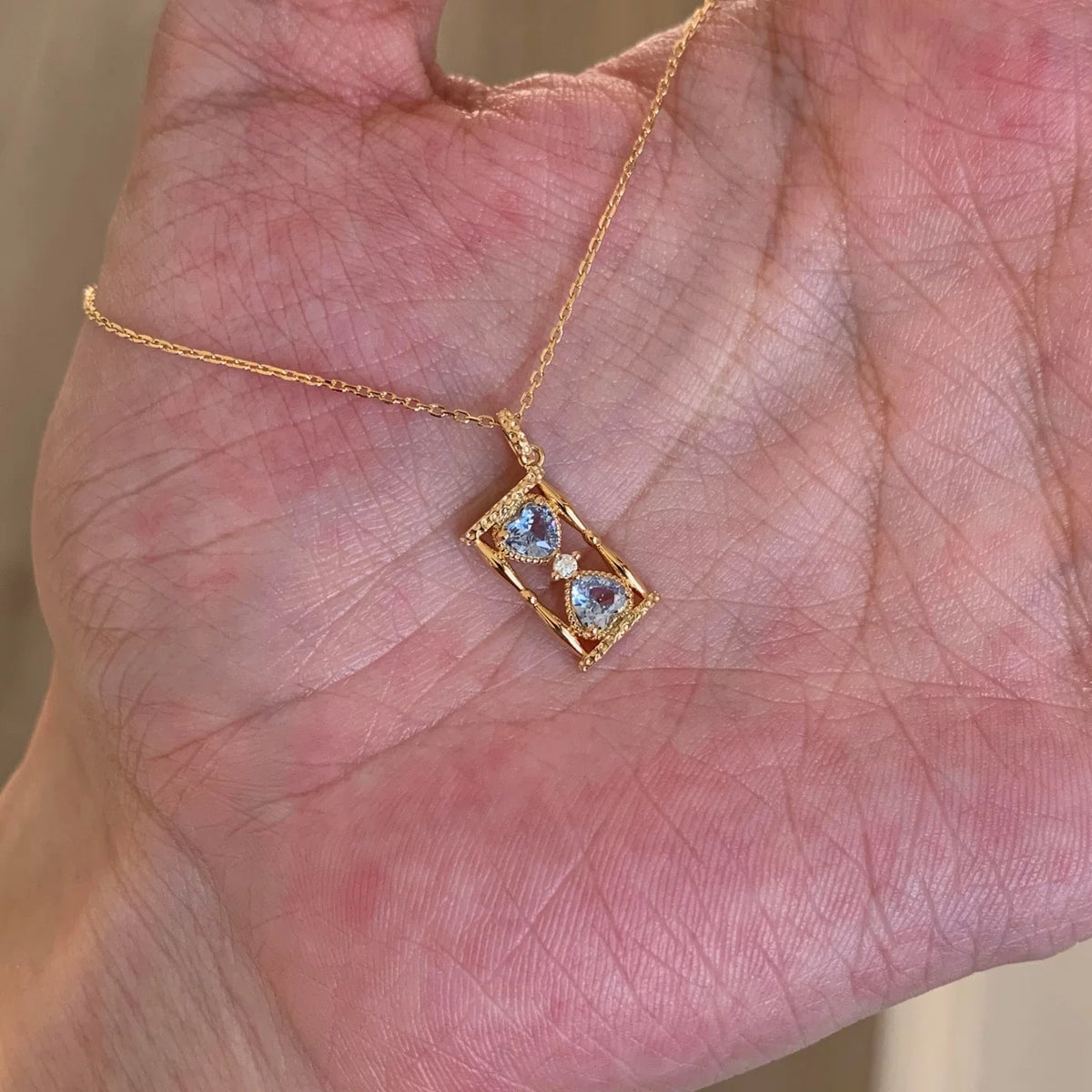 Elegant Hourglass Crystal Pendant Necklace