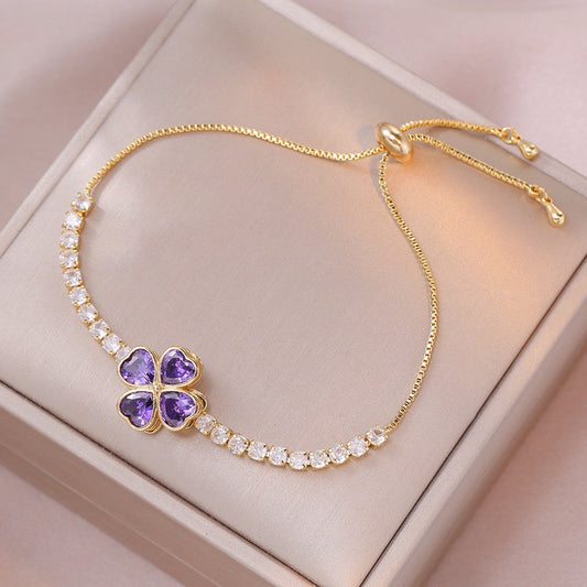 Stainless Steel Clover Spin Bracelet – Elegant & Lucky Charm 💜🍀